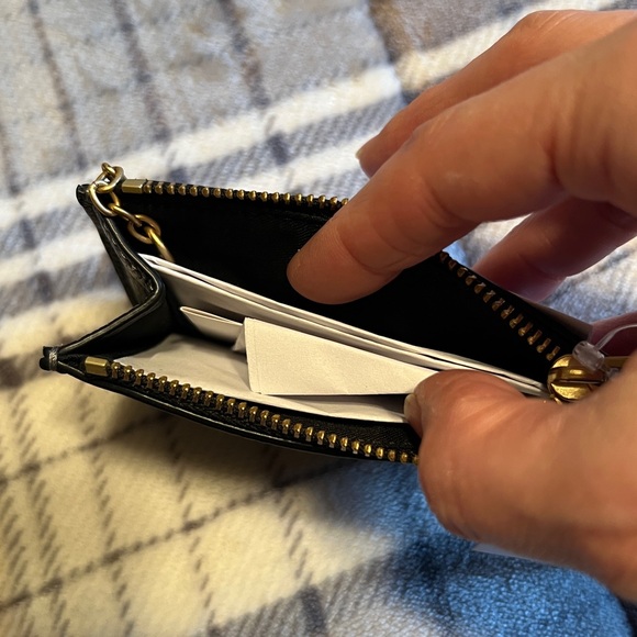 This is a Coach Mini Skinny ID Case in black polished pebble leather. - Picture 7 of 7